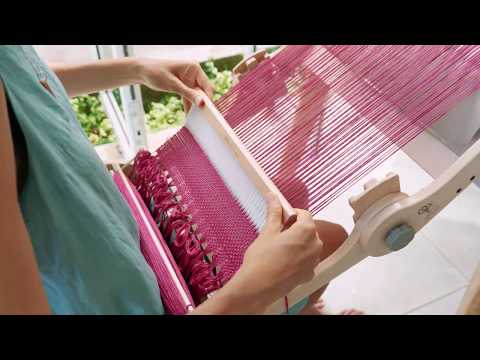 Weaving on an Ashford Knitters loom in Thailand. Fran Caselli